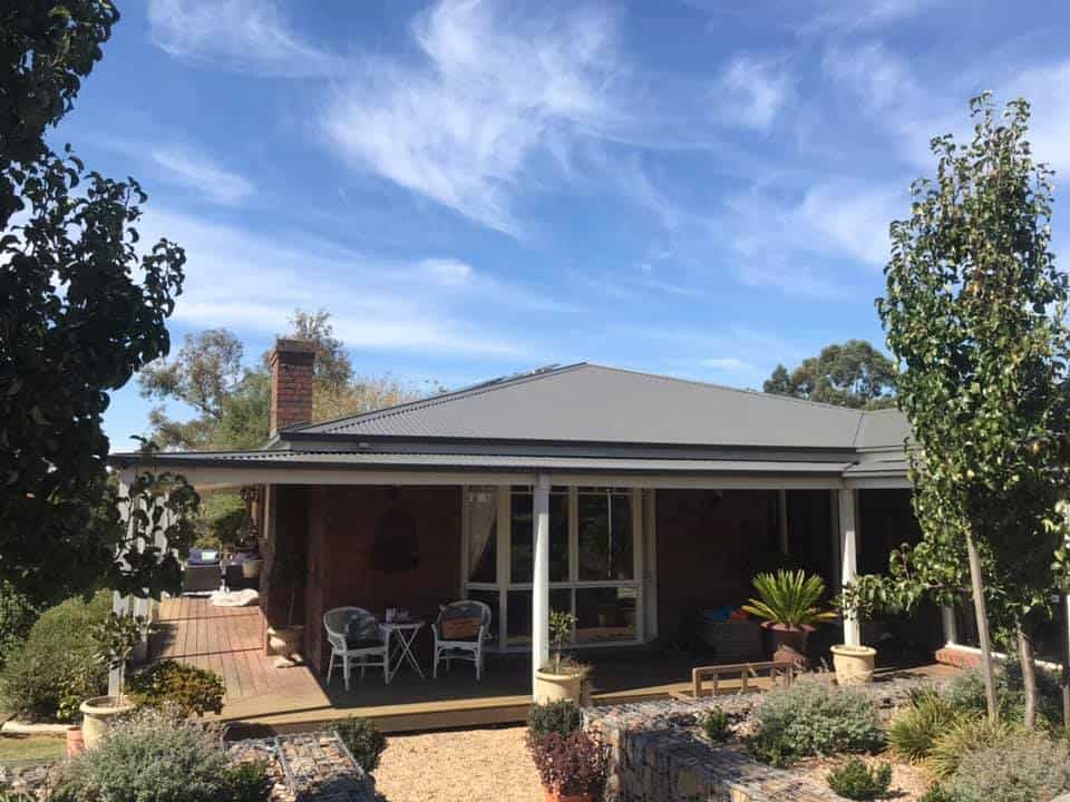 How Much Does It Cost To Paint A Roof?