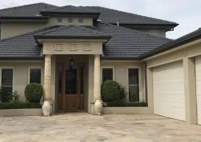 this tiled roof was re-painted and re-pointed