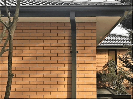 Dark gutter and downpipe